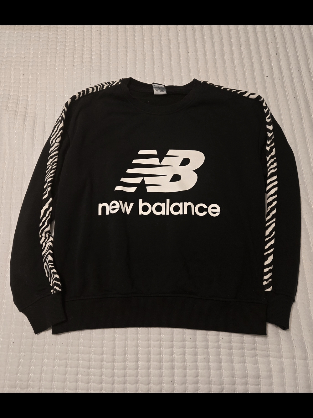 New Balance Black Crewneck Sweatshirt with White Logo and Zebra Sleeve Stripes